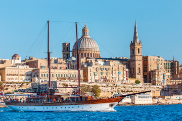 Fototapeta na wymiar Valletta cityscape with sailboat, Malta, EU