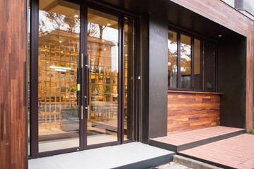 Wooden design of the entrance to the building