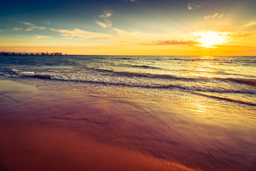 Fototapeta na wymiar Glenelg Beach dramatic sunset