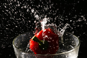 splashing water fresh pepper chili still life studio photograph 