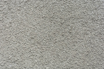 The texture of the wall plaster gray