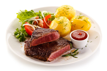 Grilled beefsteak with potatoes on white background