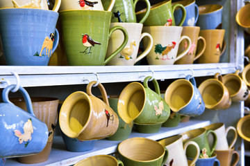 Handmade ceramic mugs for sale in Cracow market