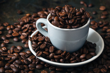 Coffe beans and cup. High resolution image