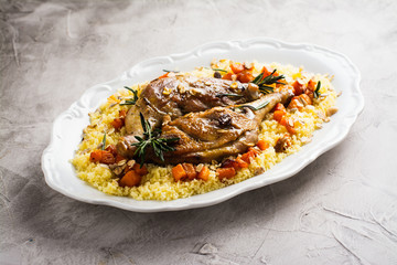 Christmas roast duck legs and couscous