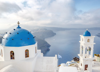 Blue and white church of Imerovigli village on Santorini island, Greece