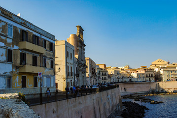 Fototapeta premium SYRACUSE, ITALY - October 06, 2012. Afternoon view of waterfront on the East side of the Ortigia island