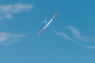 RC soaring plane on blue sky