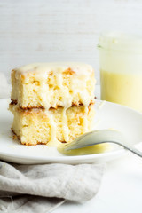 Lemon cake on a white plate.