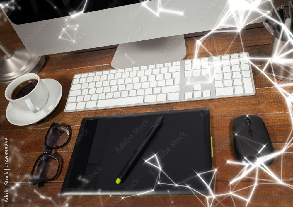Aufkleber graphics tablet in front of computer with white network overlay