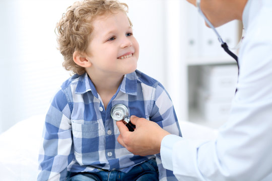 Doctor examining a child  patient by stethoscope.