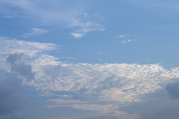 Naklejka na ściany i meble White cloud on blue sky.