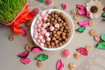 Crispy mixed pink and chocolate balls for breakfast