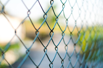 Blue welded wire mesh fence for vintage background or texture.