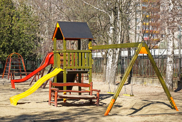 Fototapeta na wymiar Slides and jungle gym at the kindergarten