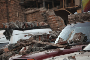 Rubble over cars during an earthquake in Chile.