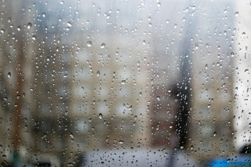 Fototapeta na wymiar rain drops on car window