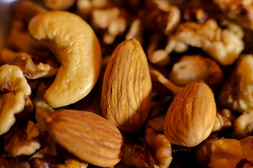 different nuts, almonds and cashews, dried nuts