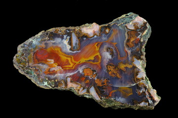 A cross section of the agate stone. Multicolored silica bands colored with metal oxides are visible. Origin: Asni, Atlas Mountains, Morocco.