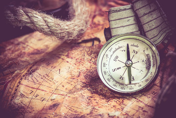 Fototapeta na wymiar Columbus day and world map with compass