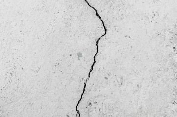 Grungy wall with large crack cement floor texture,cement large crack for background