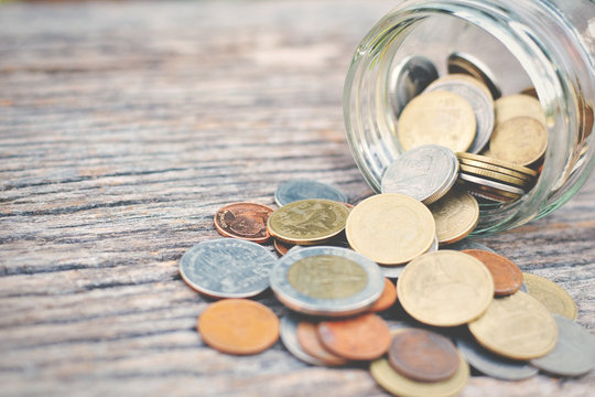 Coin In Glass Jar On Old Wood Concept Save Money