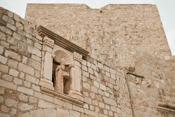 Croatia, Dubrovnik, one of the city figurine of saint in the wall