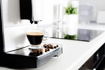 Professional home coffee maker in modern kitchen