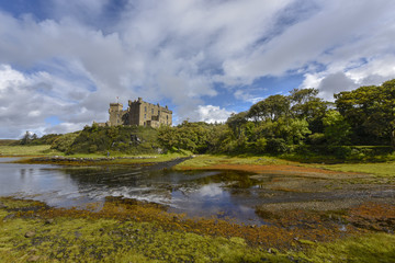 Fototapeta na wymiar Dunvegan Castle in Scotland, typical scottish castle, Isle of Skye, Scotland, Inner Hebrides, Scotland, Great Britain