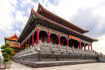 Lion statue and buddha state on chinese temple in Thailand