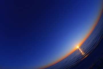 Beautiful sunset on the sea. Fisheye lens