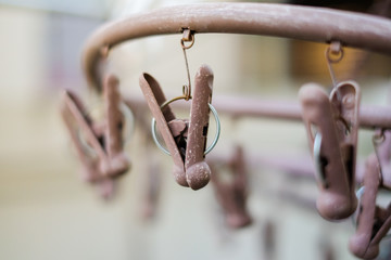 Brown plastic cloth clamp for vintage background or texture.