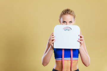 Frustrated woman unhappy with weight gain