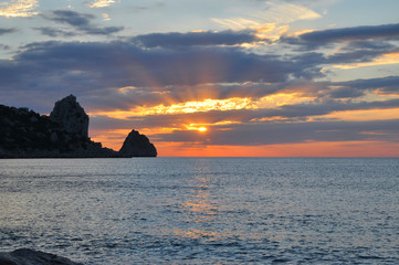 Naklejka na ściany i meble picturesque sunset on the sea