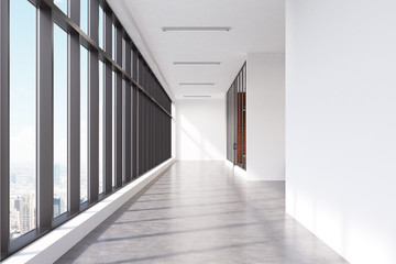 Empty office corridor with panoramic window