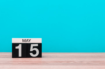 May 15th. Day 15 of month, calendar on turquoise background. Spring time, empty space for text. World Remembrance Day Of AIDS Victims