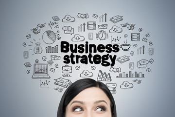 Woman s head and business strategy