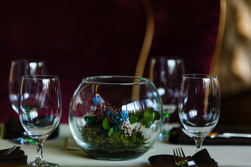 Empty glasses set in restaurant Glasses in the restaurant on the table flowers