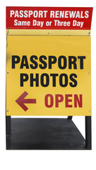 PASSPORTS PHOTOS sign. Isolated. Vertical.