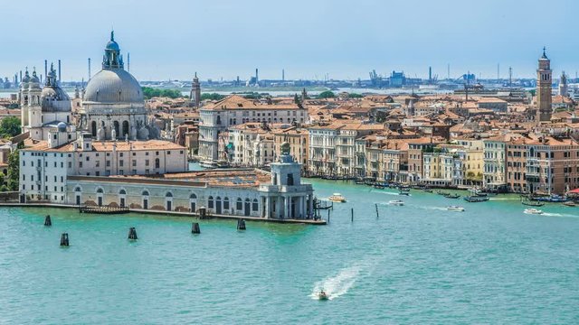 Venice cityscape with Salute Basilica across channel, sightseeing tour, travel