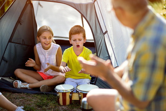 children enjoying playing in the tent.