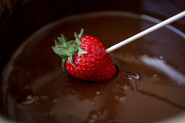 strawberry on melted chocolate.