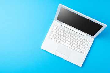 Modern computer on blue background