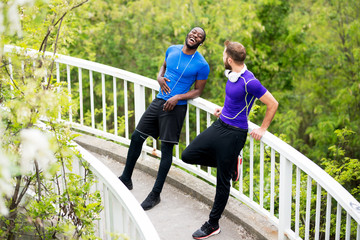 Two guys laughing after a run 