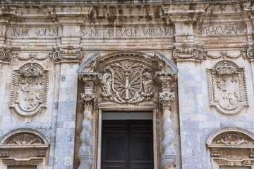 Details of Abbey Church of Saint Lucy at Cathedral Square on Ortygia isle, Syracuse city, Sicily Island in Italy