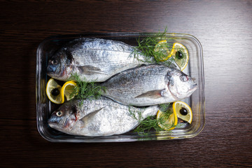 Fresh fish with herbs and lemon