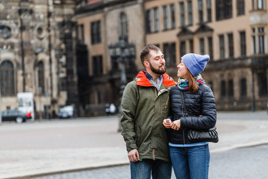 Couple in love looking at each other in the Dresden street