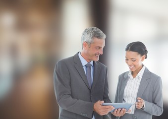 Business people using digital tablet in office