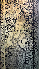 Fototapeta na wymiar Thai style painting on the door of Wat Chedi Laung temple, Chiang Mai city, Thailand