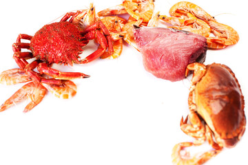 Delicious seafood - Red crab and tuna steak  on white plate isolated on white  background. .